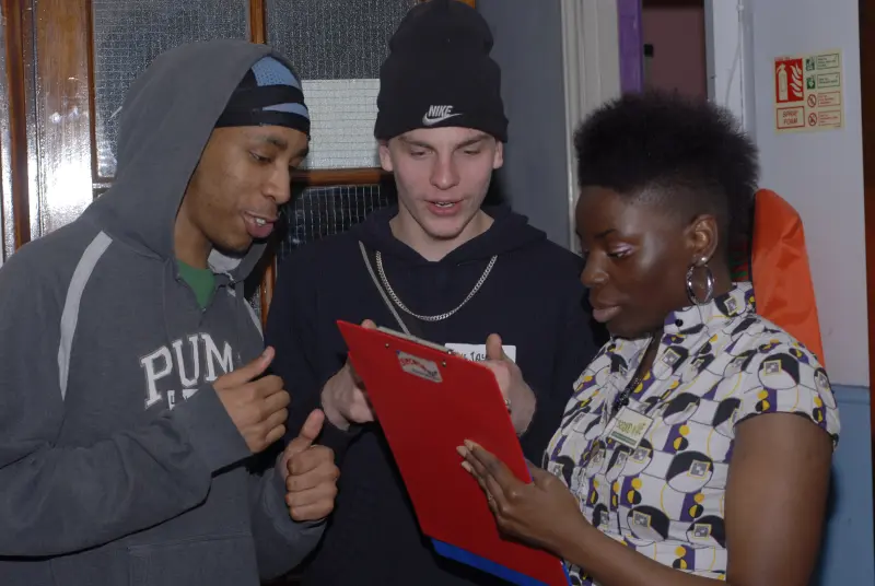 young people filling in registration form